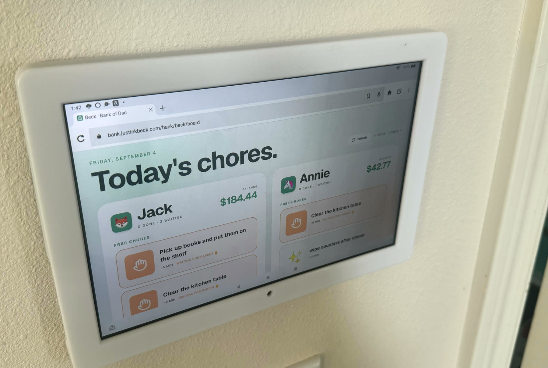 Bank of Dad chore board on a wall-mounted kitchen tablet